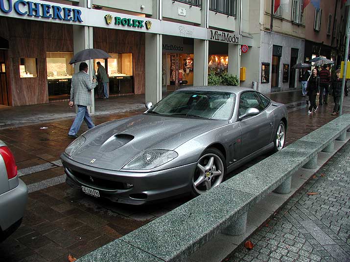 A Ferrari in front of the Bucherer store in Lugano, Switzerland