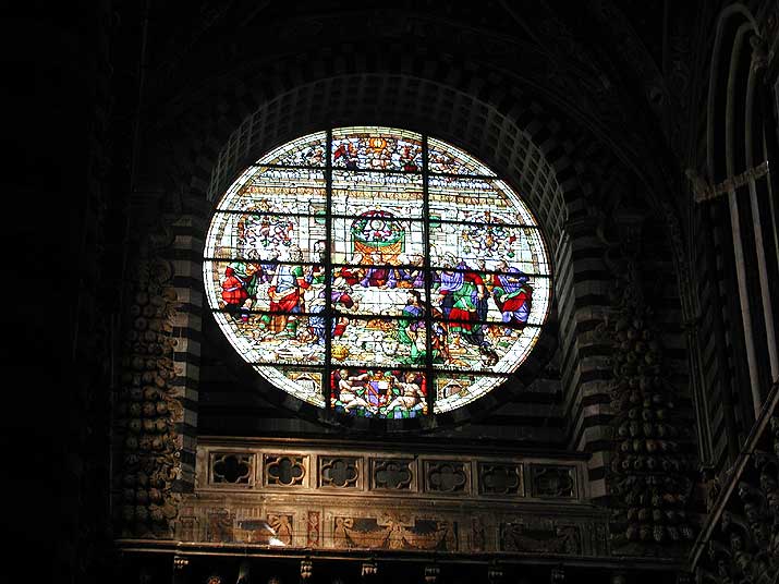 The stained-glass window in the duomo in Siena, Italy