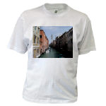 A canal with a leaning tower in Venice